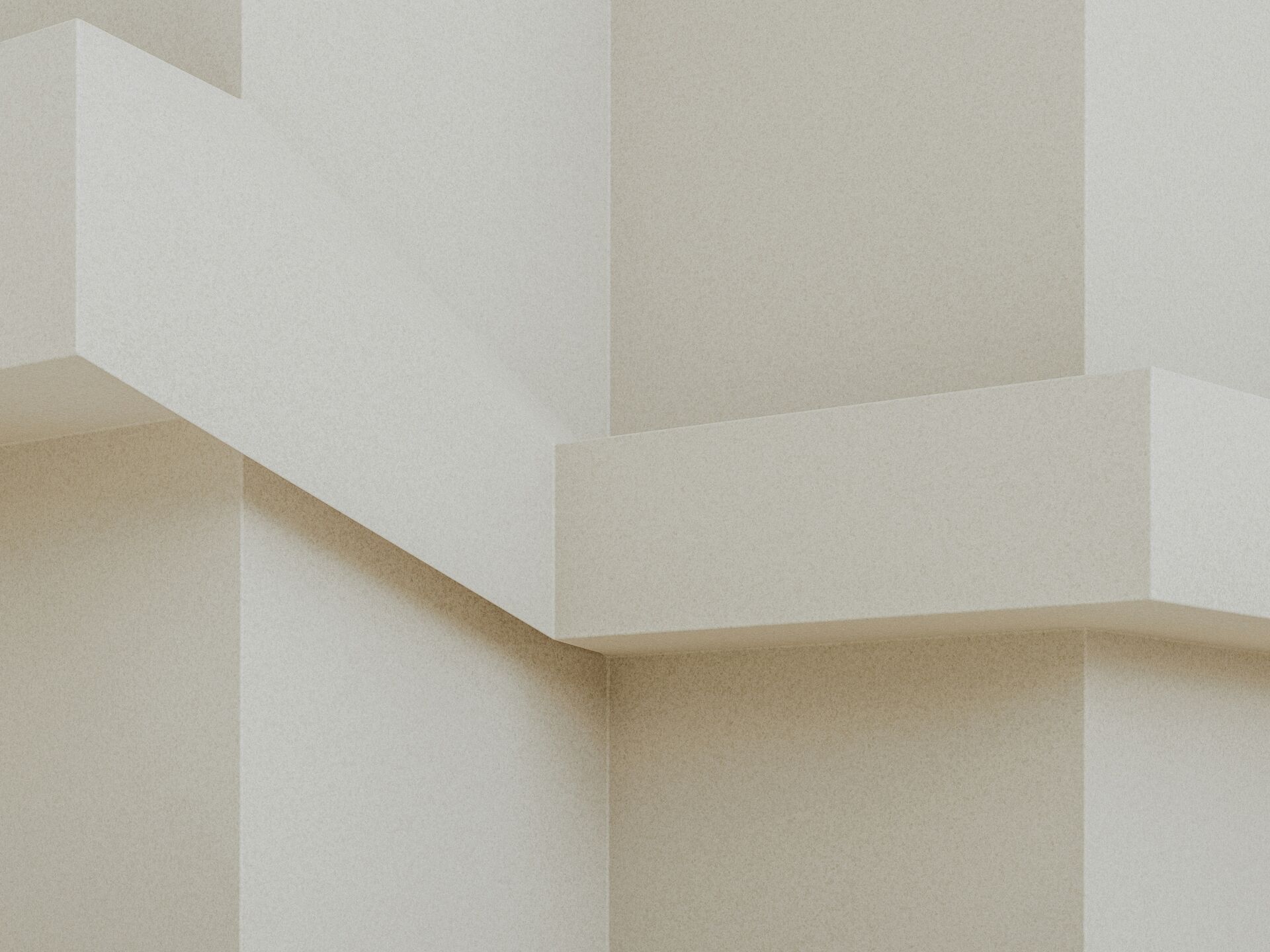 Abstrakte Architektur mit geometrischen Formen in hellen Beigetönen, die Tiefe und Struktur erzeugen.